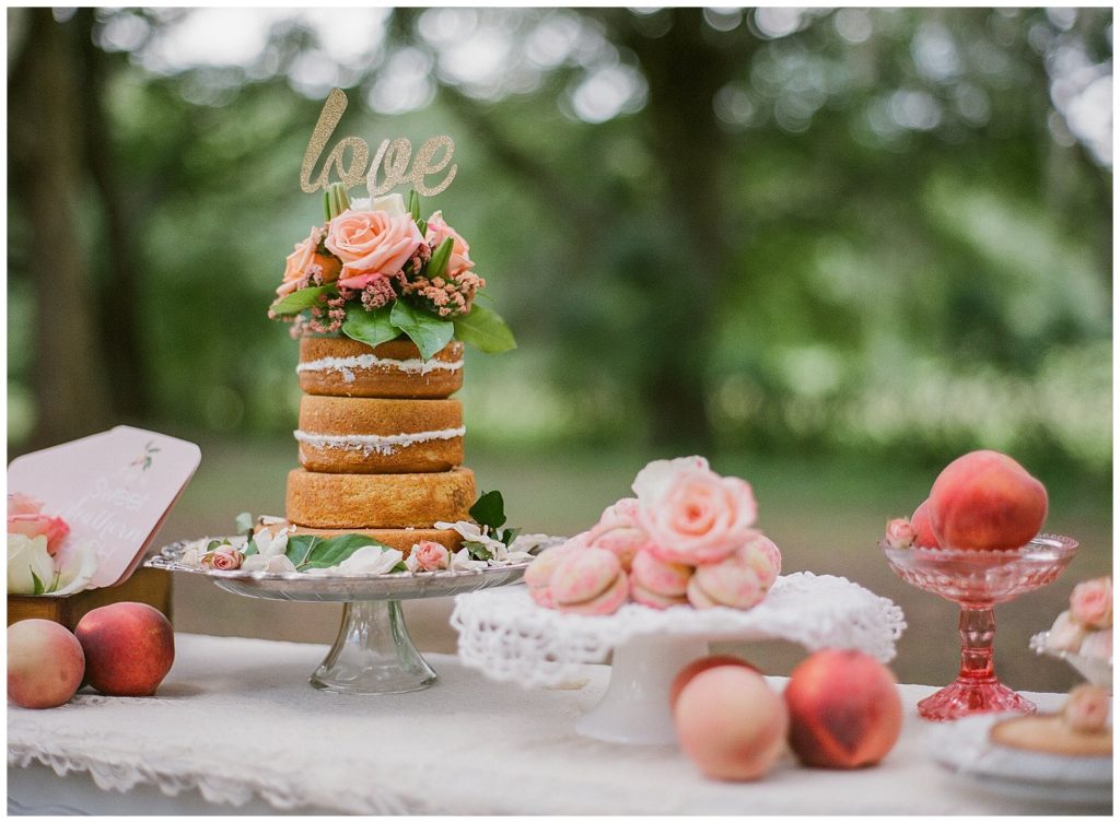 naked wedding cake with roses