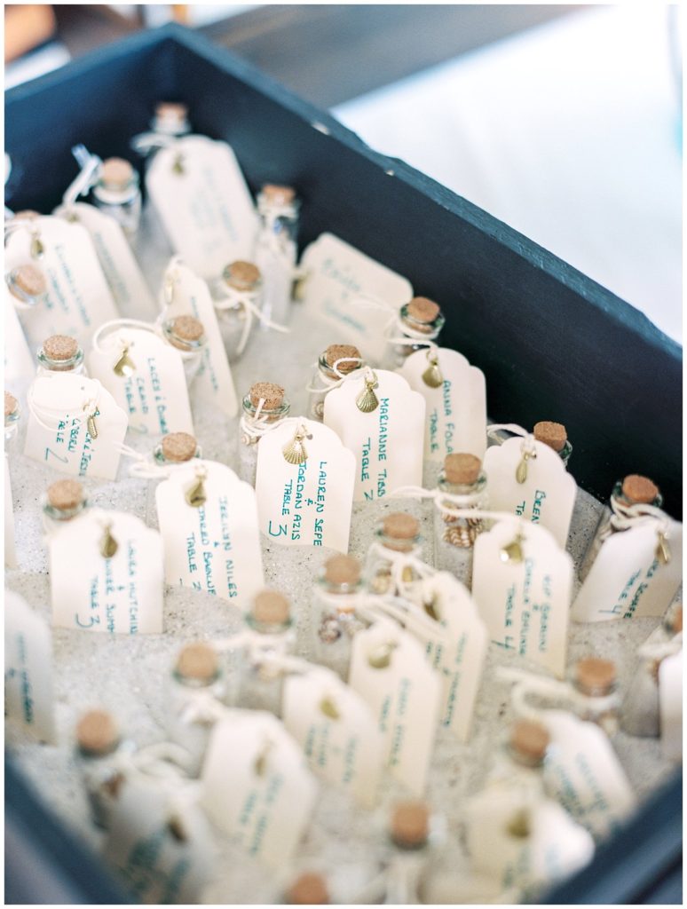 message in a bottle escort cards at Carlouel Yacht Club || The Ganeys