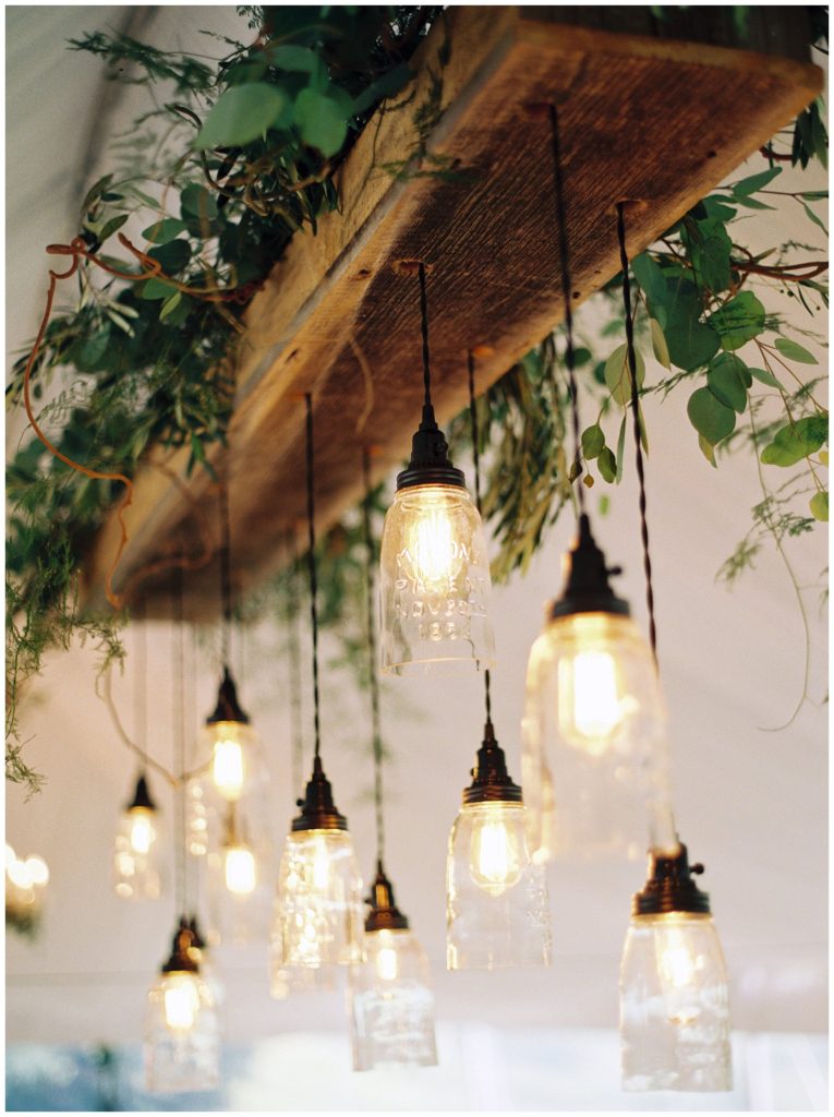 Mason jar chandelier with greenery || The Ganeys