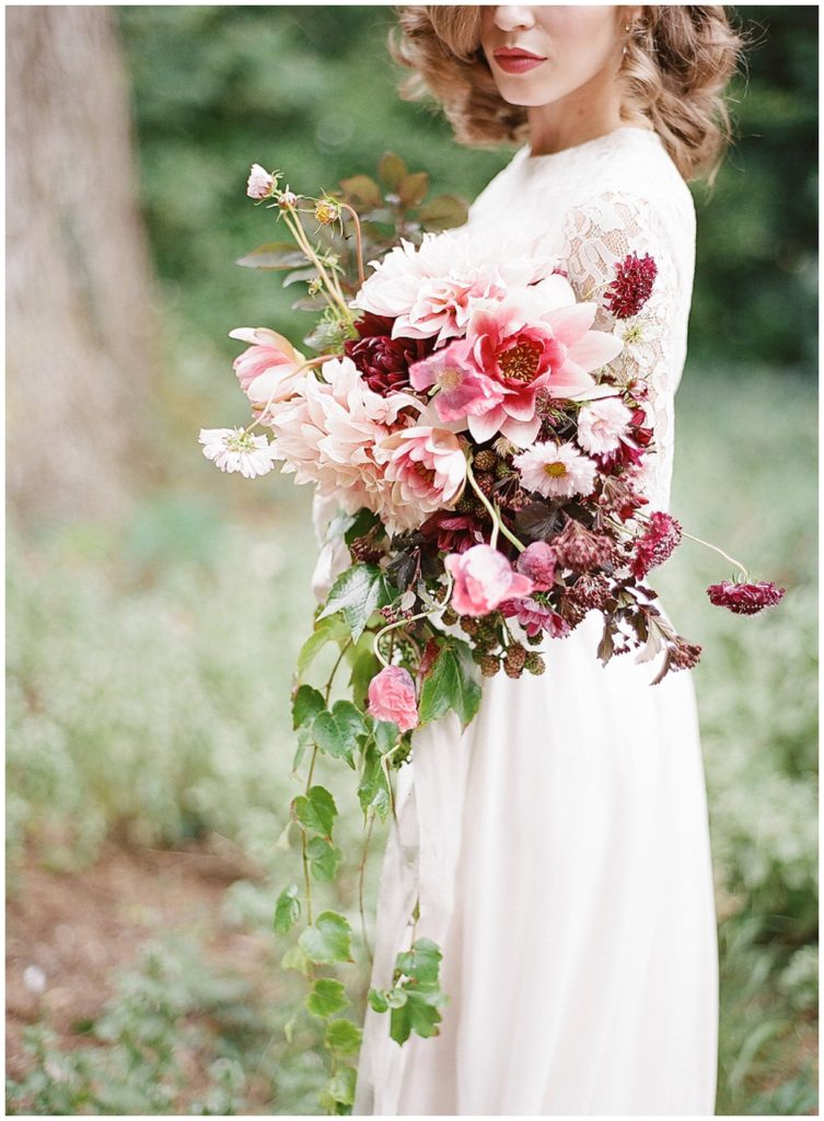 Pink and maroon cascading bouquet by Bows & Arrows || The Ganeys