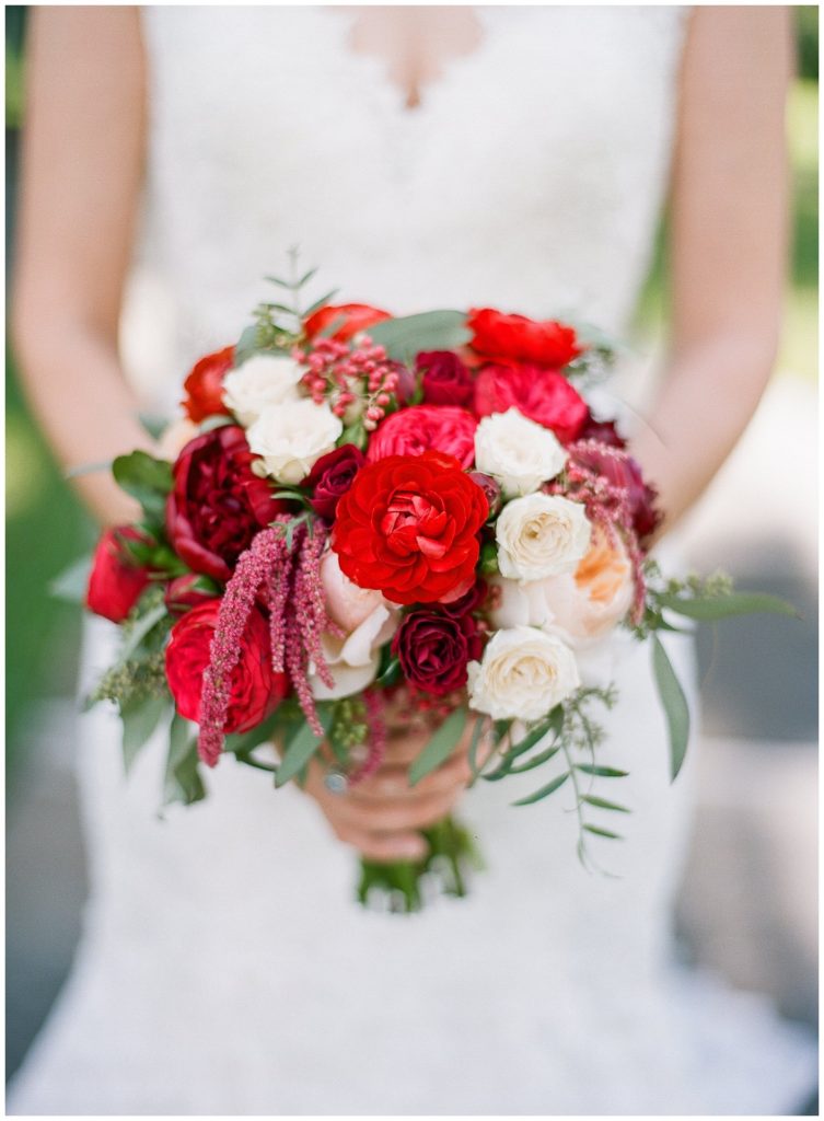 Red and white wedding bouquet by Flowers by Lesley, wedding at Leu Gardens || The Ganeys
