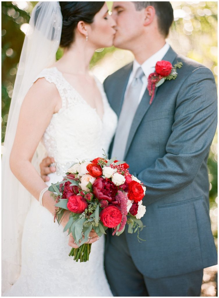 Red and white wedding bouquet by Flowers by Lesley, wedding at Leu Gardens || The Ganeys