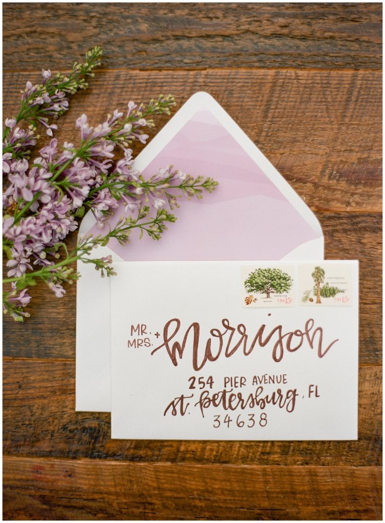 Lavender and copper wedding invitation, hand lettering by Emily Grace Designs || The Ganeys