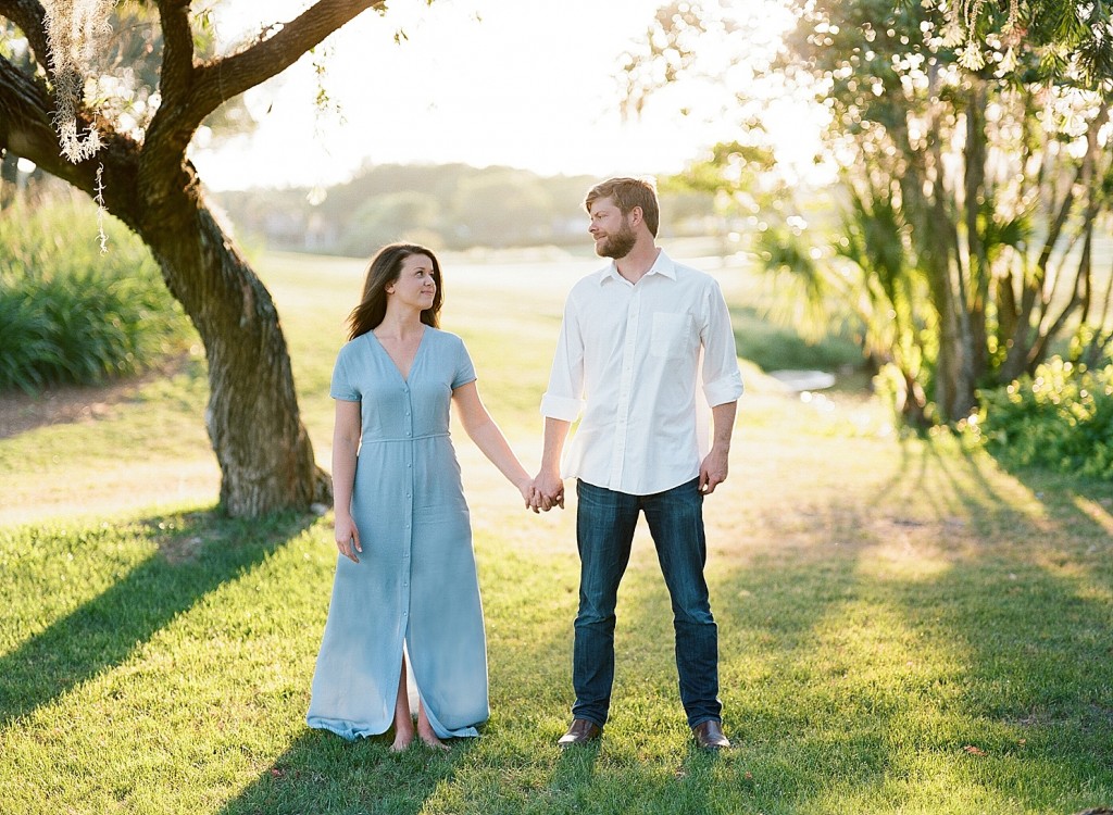 engagement photos on a golf course
