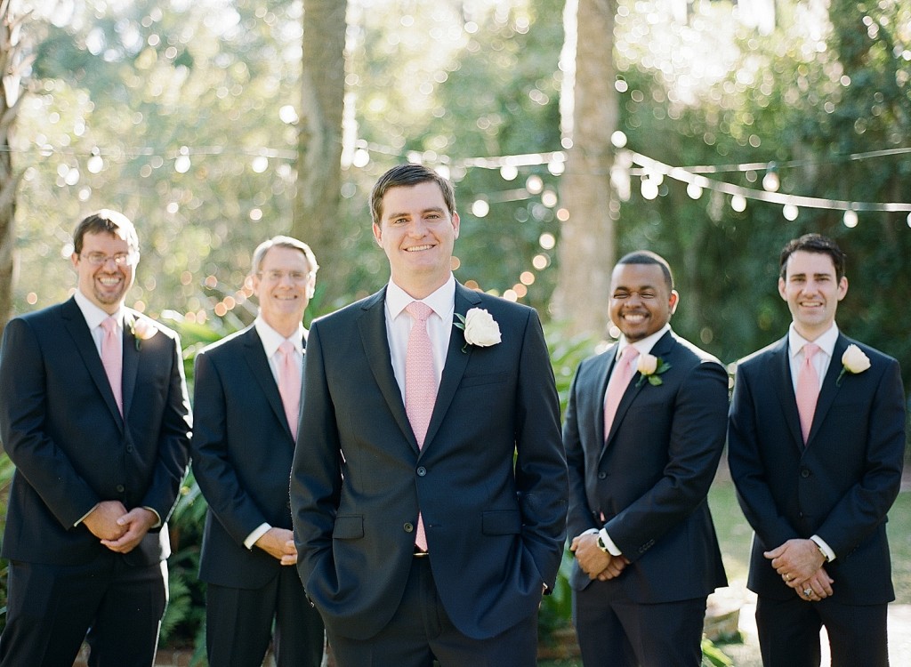 groomsmen navy blue suit and pink tie