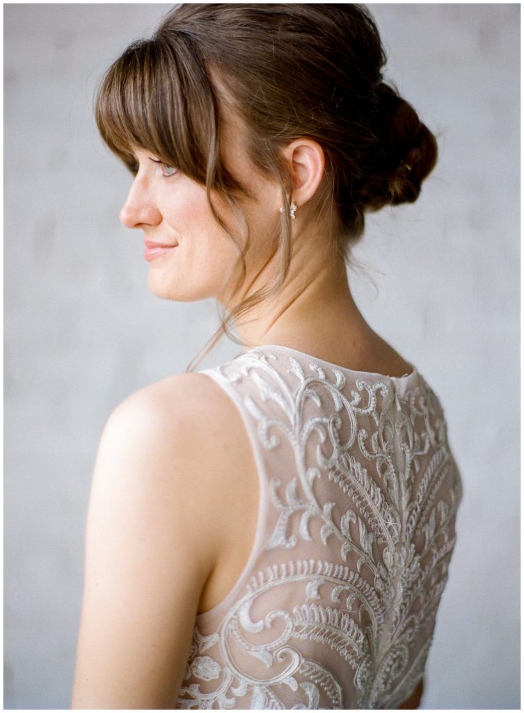 Bridal bun with bangs, Lasting Luxe hair and makeup, styled by Amber Veatch Designs || The Ganeys
