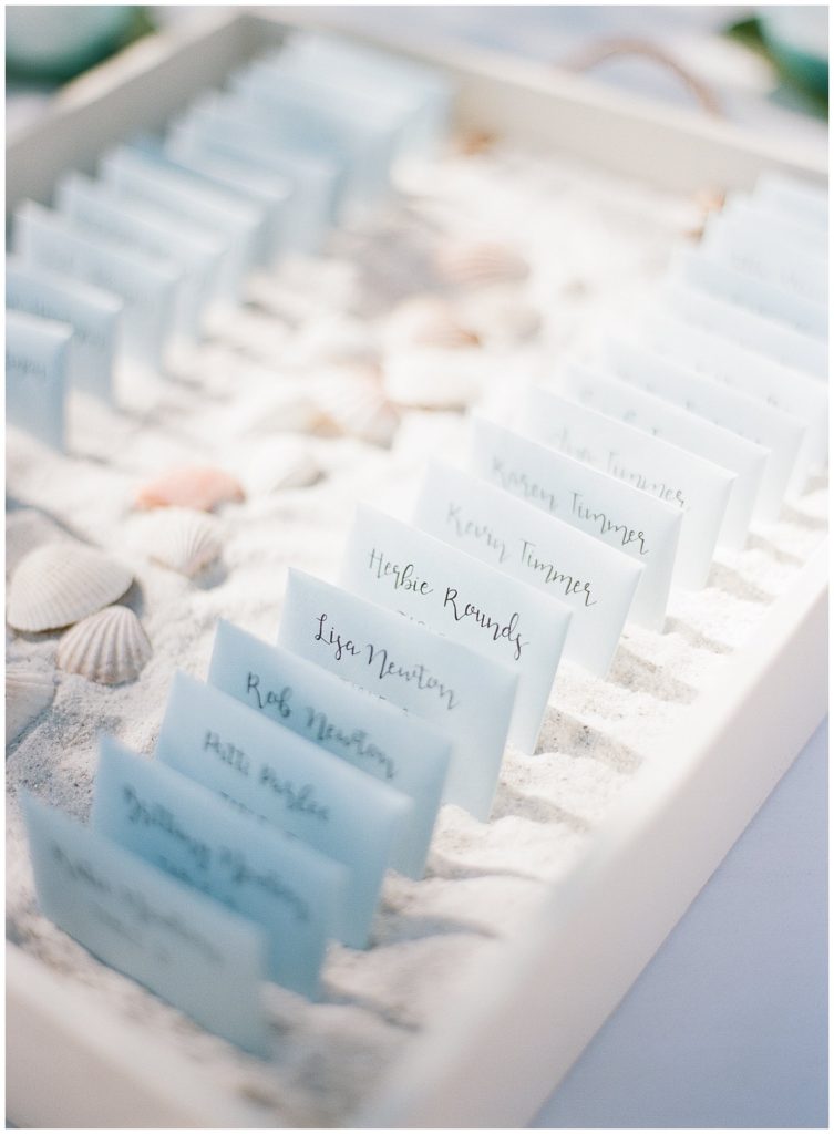 Letters as escort cards at Postcard Inn || The Ganeys