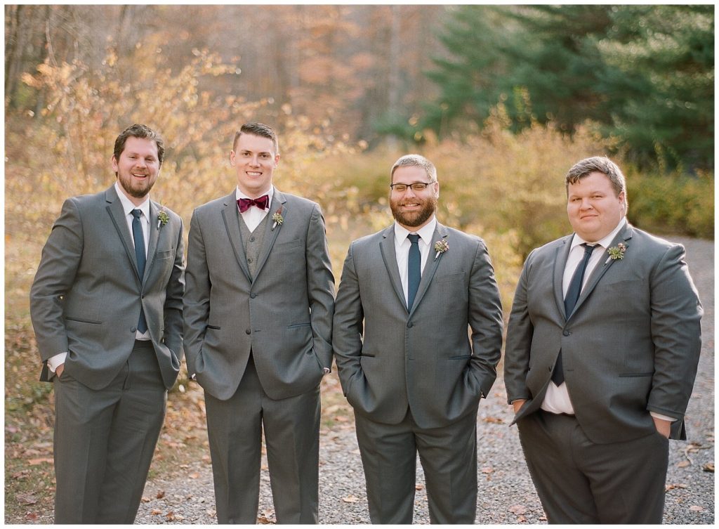 Gray groomsmen suits for a fall wedding