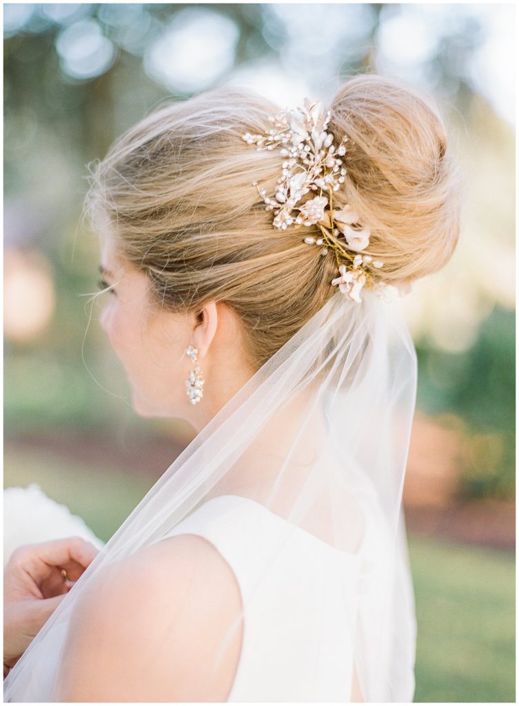 Bridal bun by Emily Artistry with BHLDN hairpiece || The Ganeys