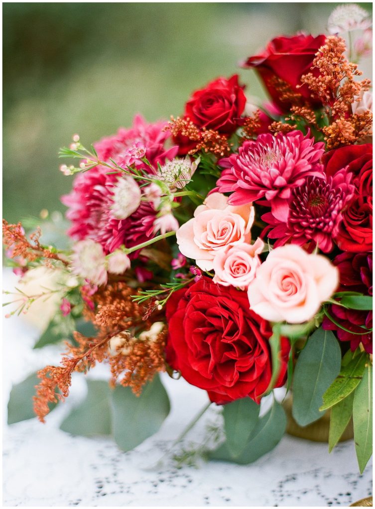 Red and pink centerpieces by Ever After Vintage Weddings || The Ganeys