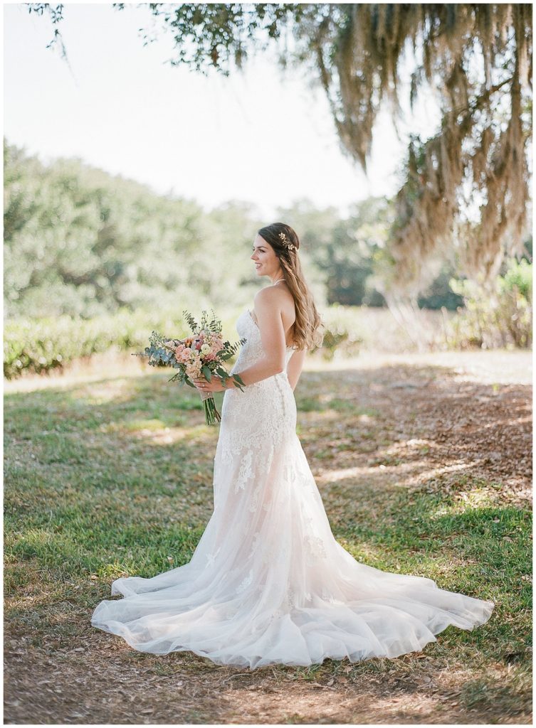 Bride in strapless lace Stella York Gown || The Ganeys