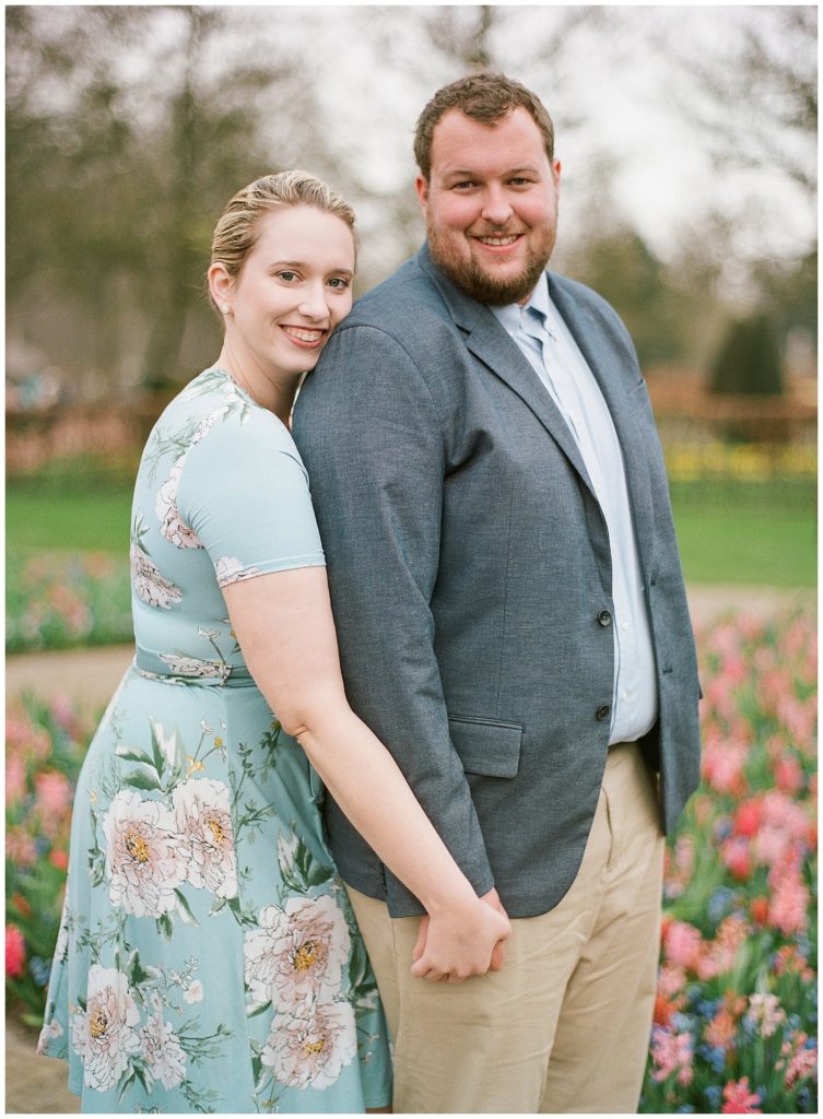 Blue floral wrap dress engagement photos at Keukenhof Gardens || The Ganeys