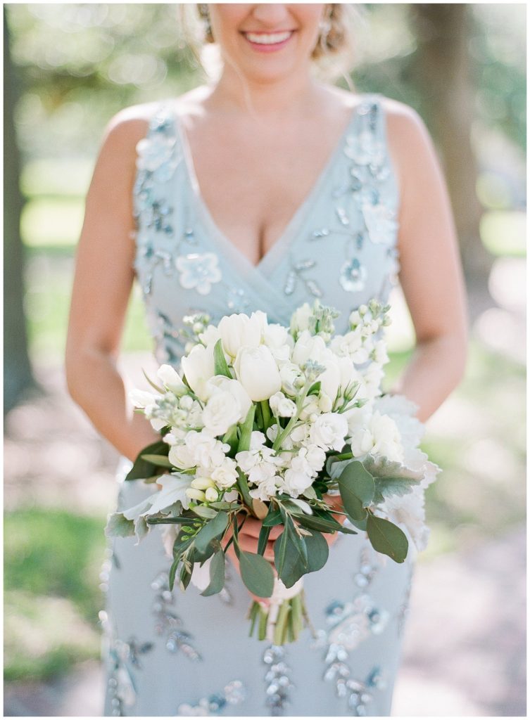 Adrianna Papell dusty blue bridesmaids dress with bouquet from FH Weddings & Events || The Ganeys