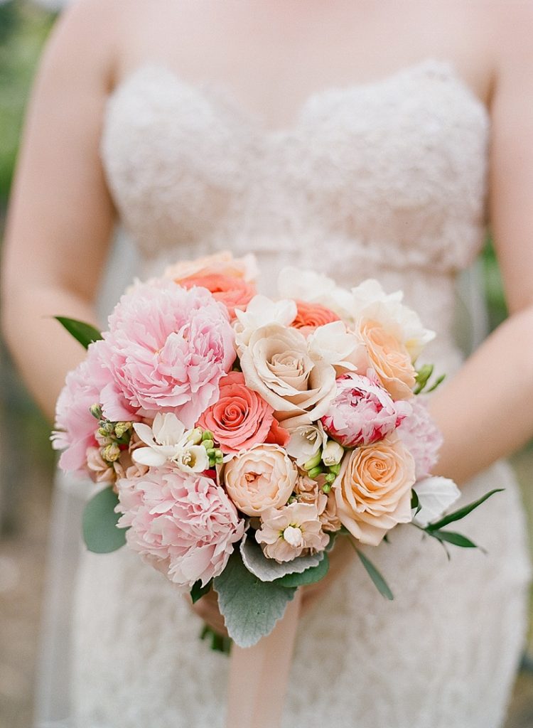 Coral, pink, and orange spring wedding bouquet || The Ganeys
