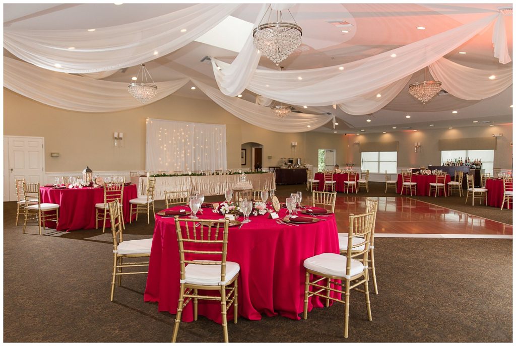 Red and white wedding with gold chiavari chairs