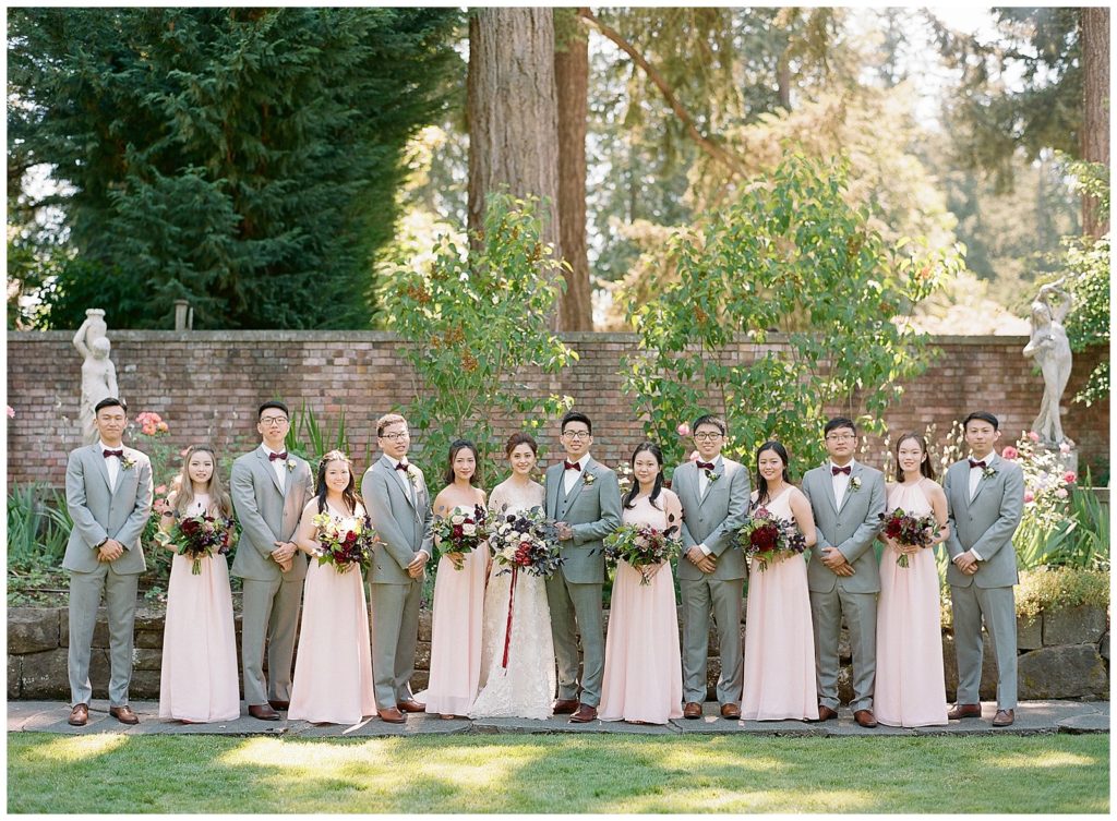 Gray and blush wedding party at Thornewood Castle