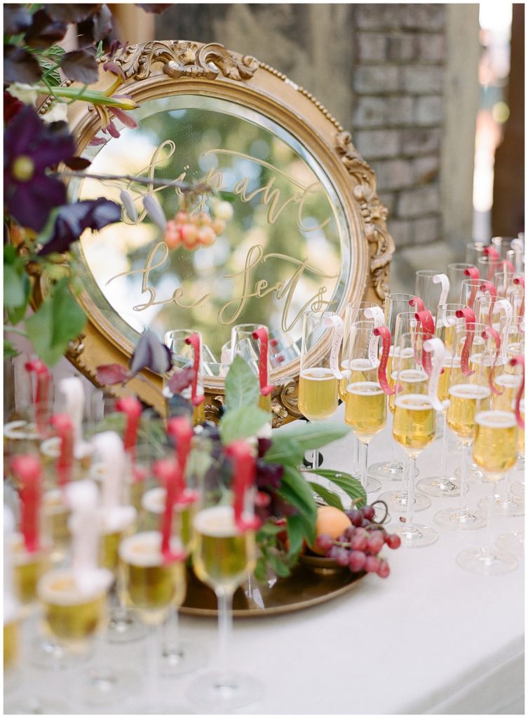 Fine Art wedding escort Display with champagne glasses