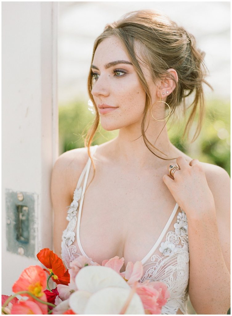 bright makeup for bride by Yessie Libby in Liz Martinez Gown with Nordstrom earrings || The Ganeys