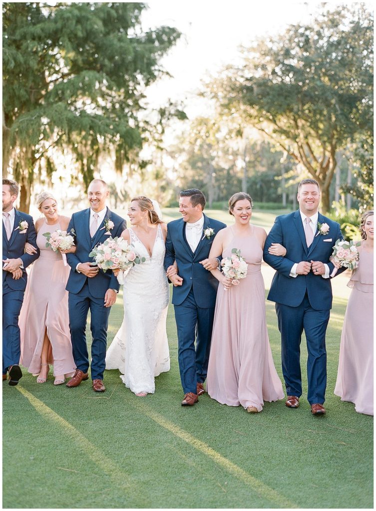 Wedding party in mauve and navy at Lake Nona Country Club || The Ganeys