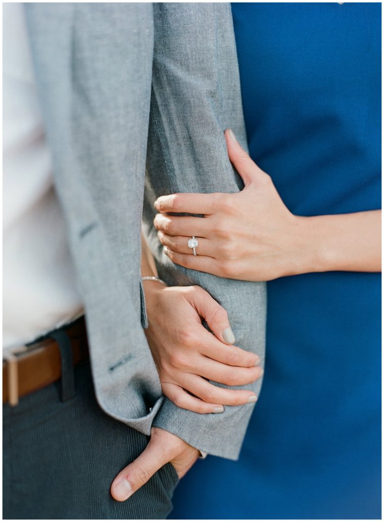 cushion cut diamond ring with royal blue dress engagement photos || The Ganeys