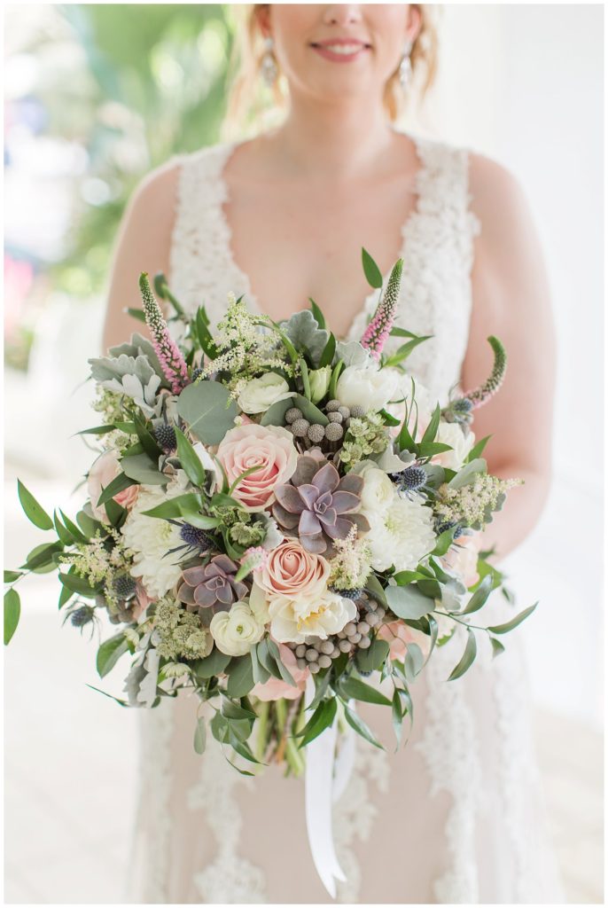 Bouquet with succulents, greenery, roses by Ms Scarlett's Flowers