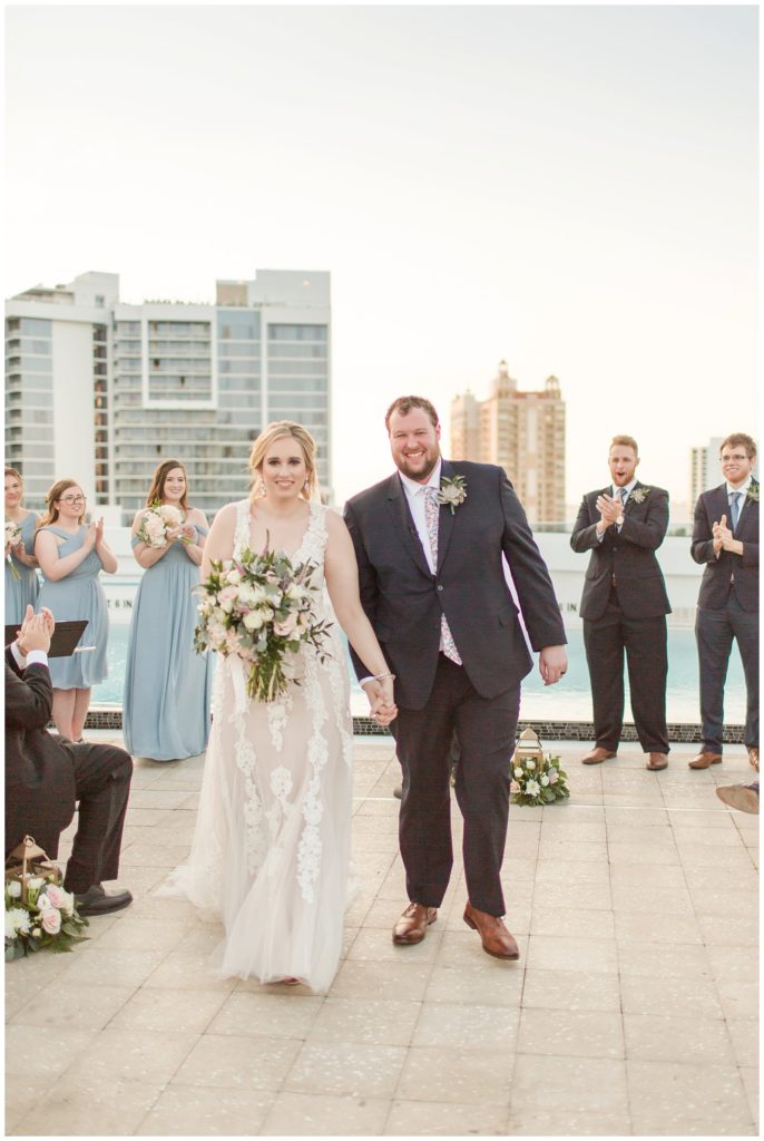 Rooftop wedding ceremony at Art Ovation Hotel in downtown Sarasota || The Ganeys