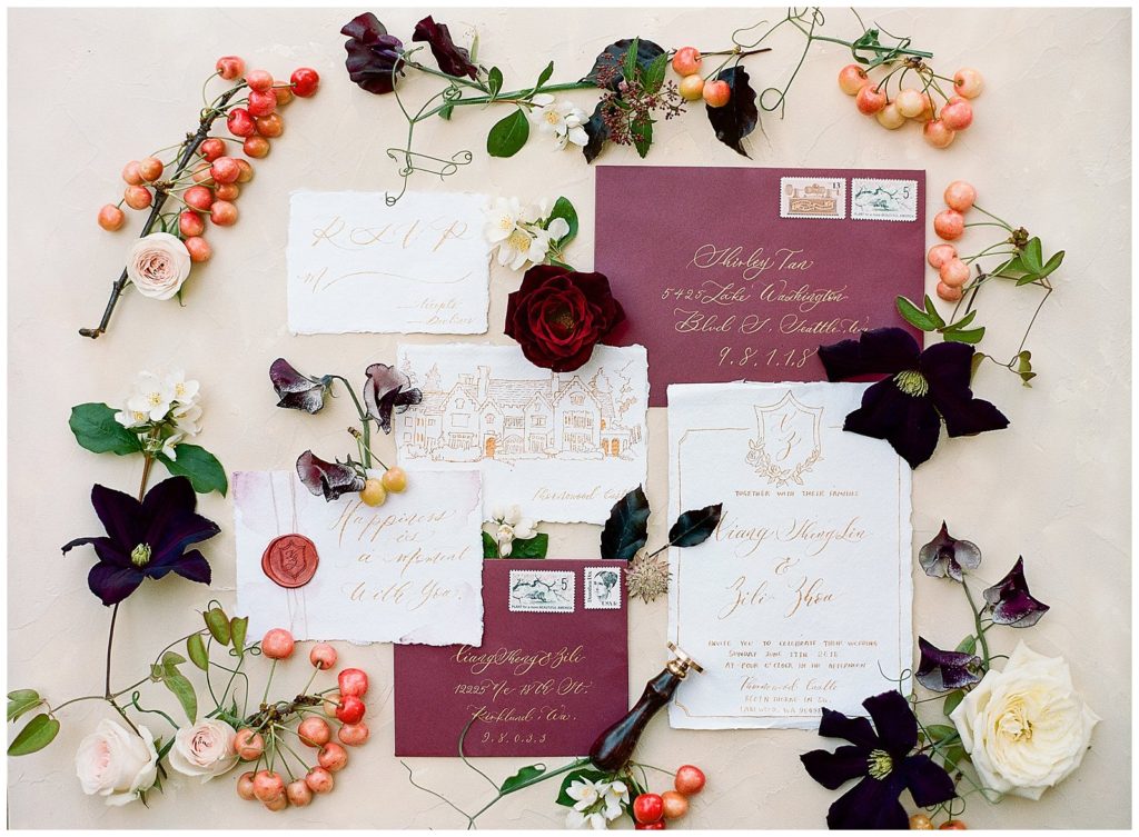 Fine art wedding invitation with maroon details for Thornewood Castle wedding