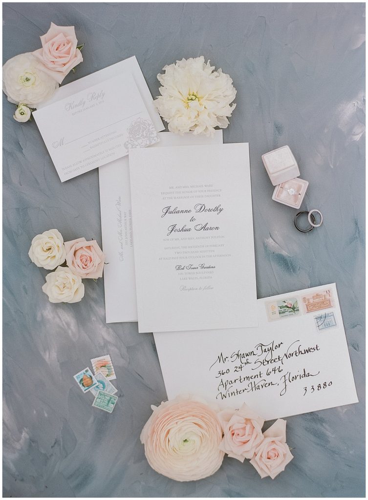 Elegant white wedding invitation from Stationery Loft || The Ganeys