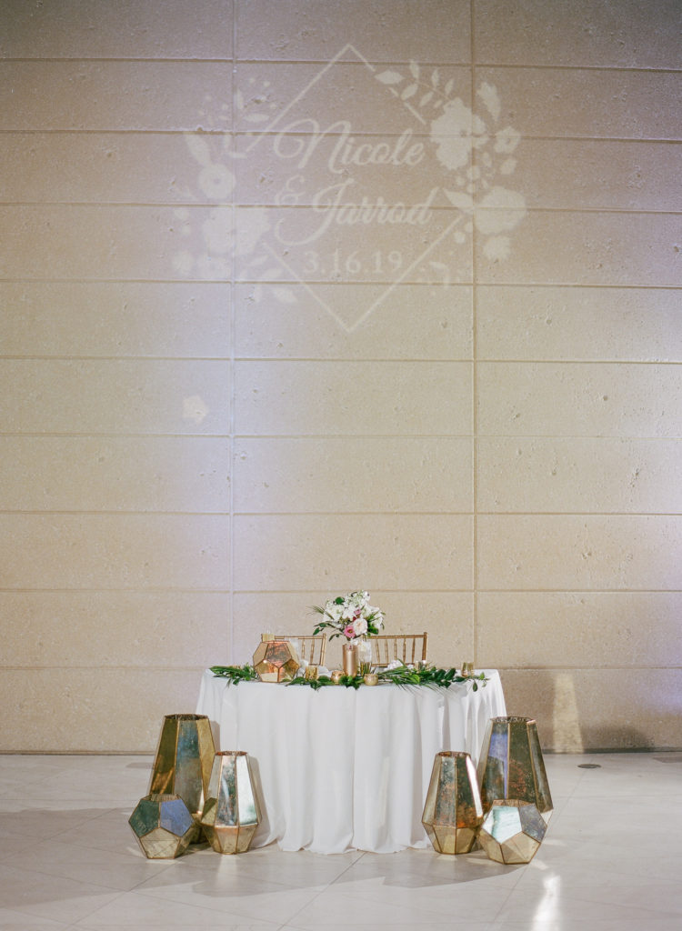 Sweetheart table at the Museum of Fine Arts St Pete with gold geometric accents and tropical vibes || The Ganeys