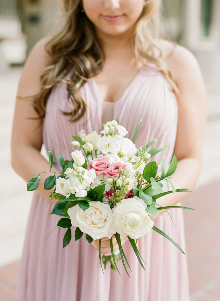 tropical bridesmaid bouquet with bridesmaid in rose Azazie dress || The Ganeys