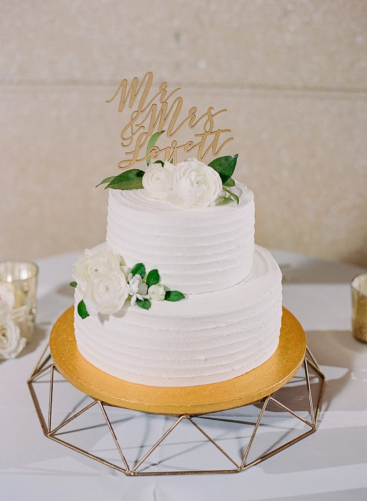 Elegant two tiered wedding cake with custom topper || The Ganeys