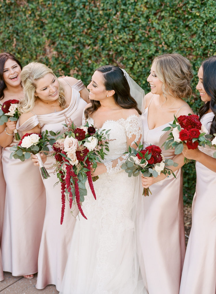 bridesmaids in Jenny Yoo Collection blush and champagne gowns at Bella Collina Wedding || The Ganeys
