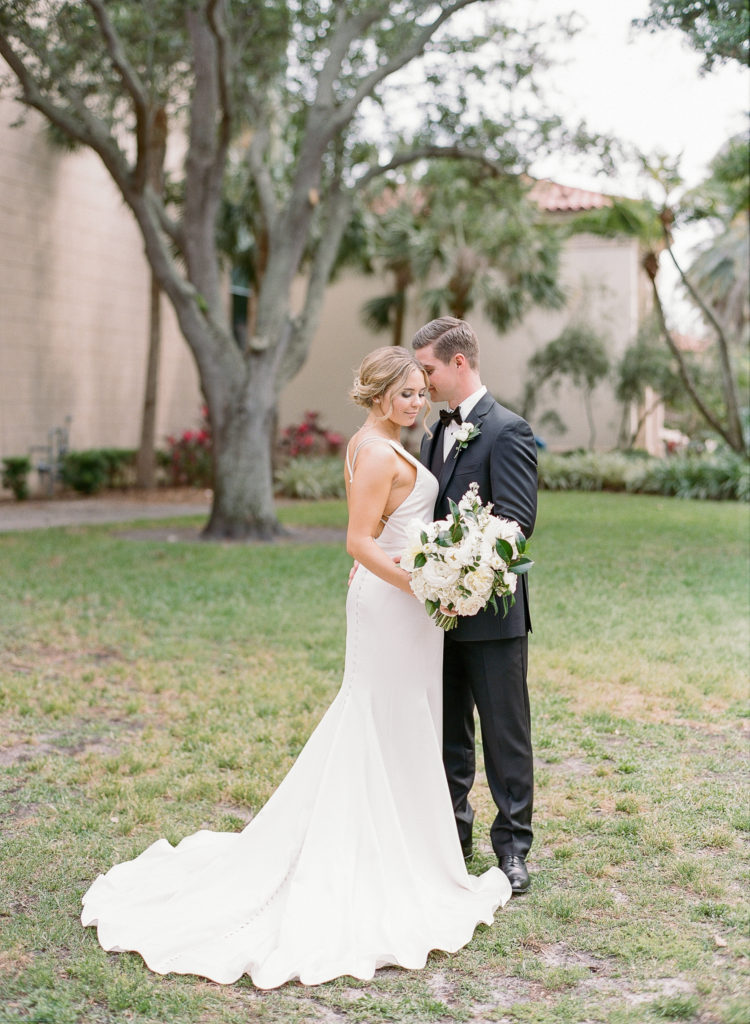 Museum of Fine Arts St Pete Wedding with Paloma Blanca Bridal wedding dress with beaded criss cross back || The Ganeys