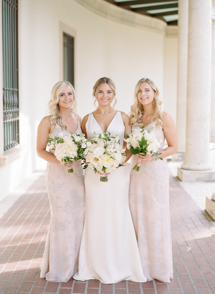Bride with bridesmaids in blush dresses at Museum of Fine Arts St Pete || The Ganeys