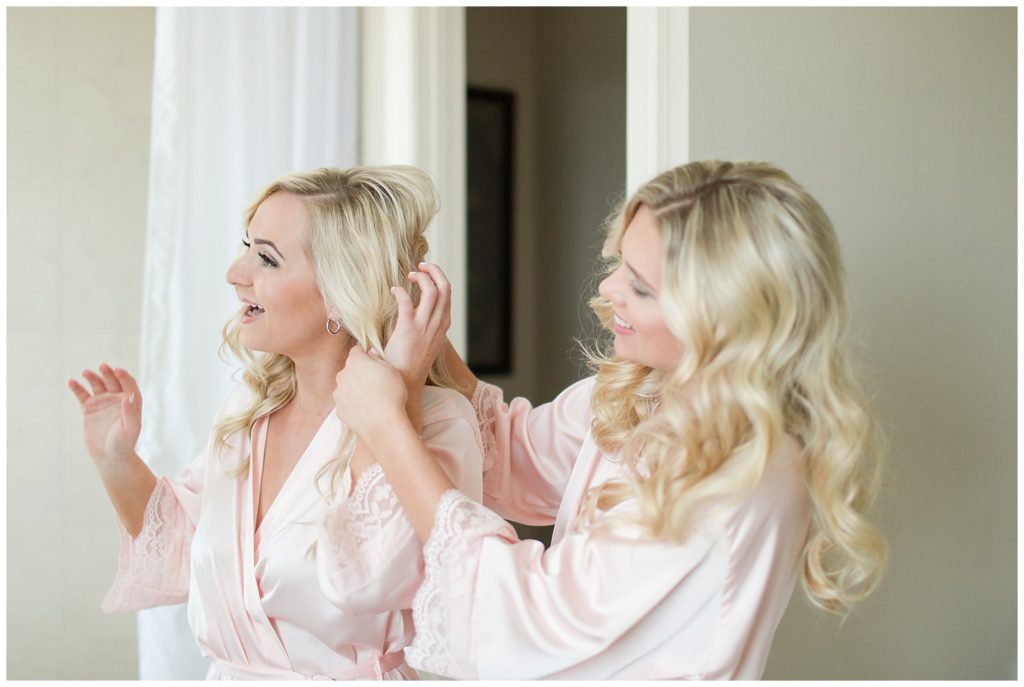 bridesmaids getting ready before wedding day