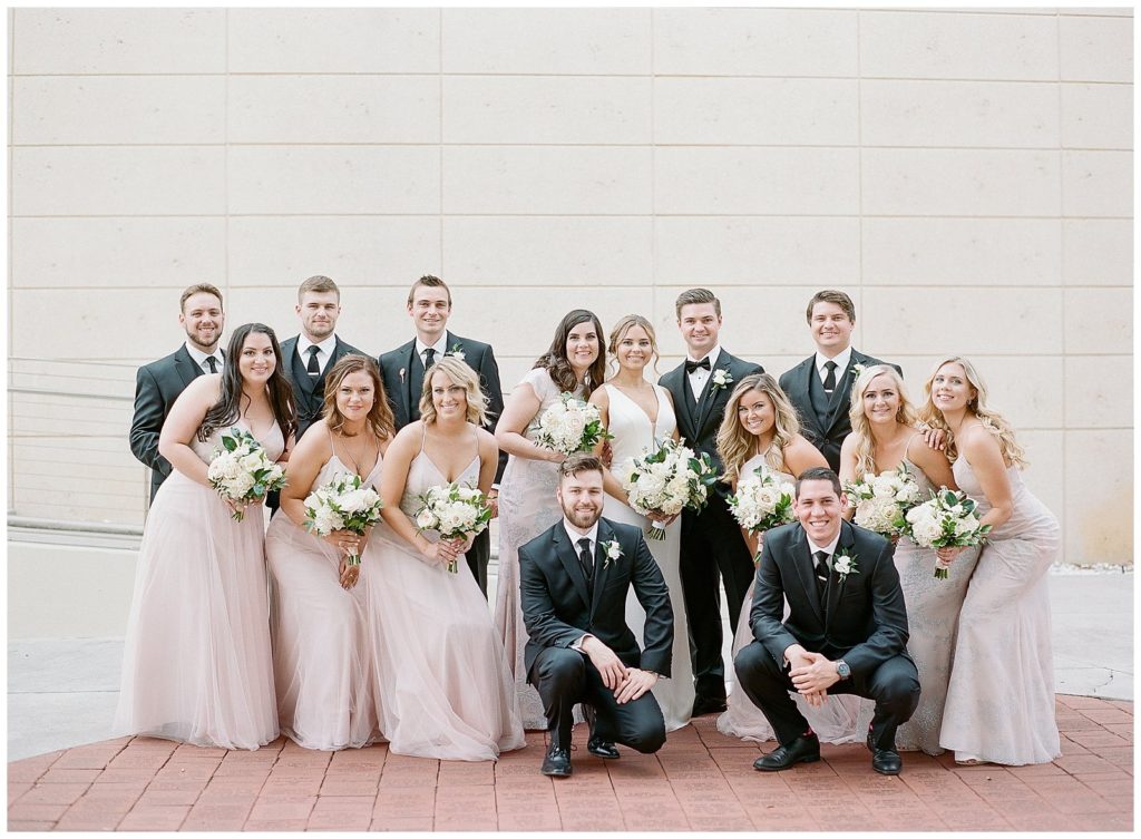 Blush and black wedding party