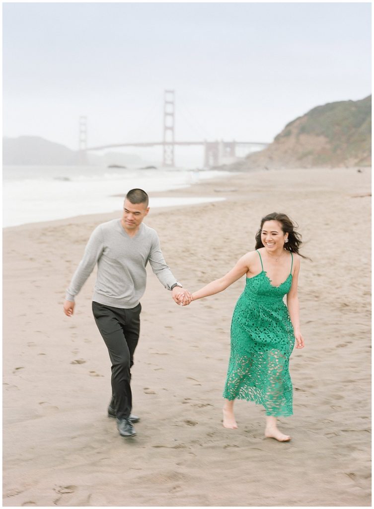Engagement photos at Baker Beach with green lace dress || The Ganeys