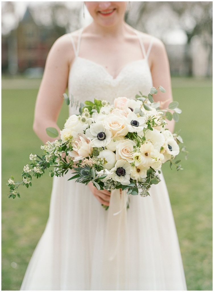 Lush white wedding bouquet with anemones and garden roses || The Ganeys
