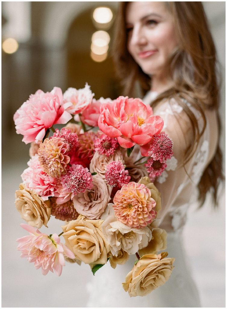 Coral and gold wedding bouquet by Gather Design Company || The Ganeys