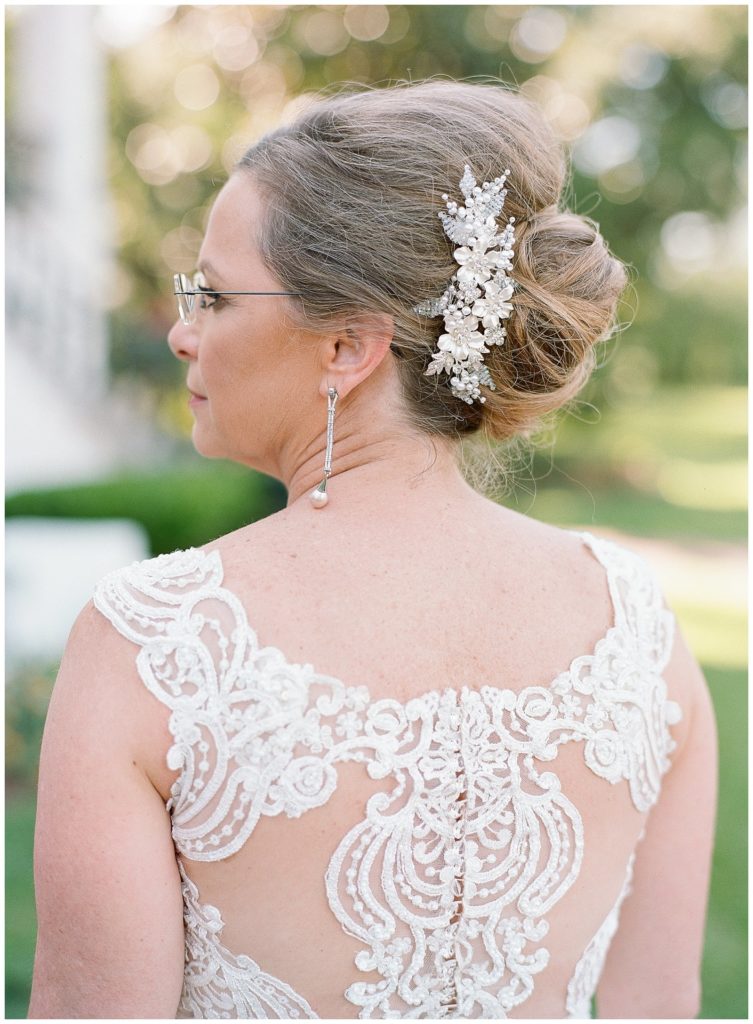 Bride with french twist hair style with bridal comb || The Ganeys