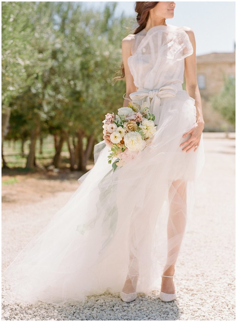 Carol Hannah Gown with asymmetrical top and tulle skirt || The Ganeys