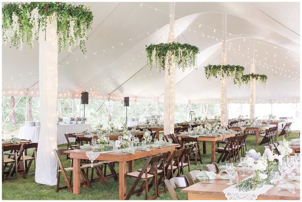 tent reception with farm tables