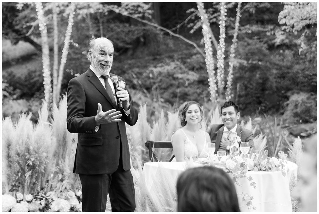 toasts at outdoor wedding reception at Nestldown