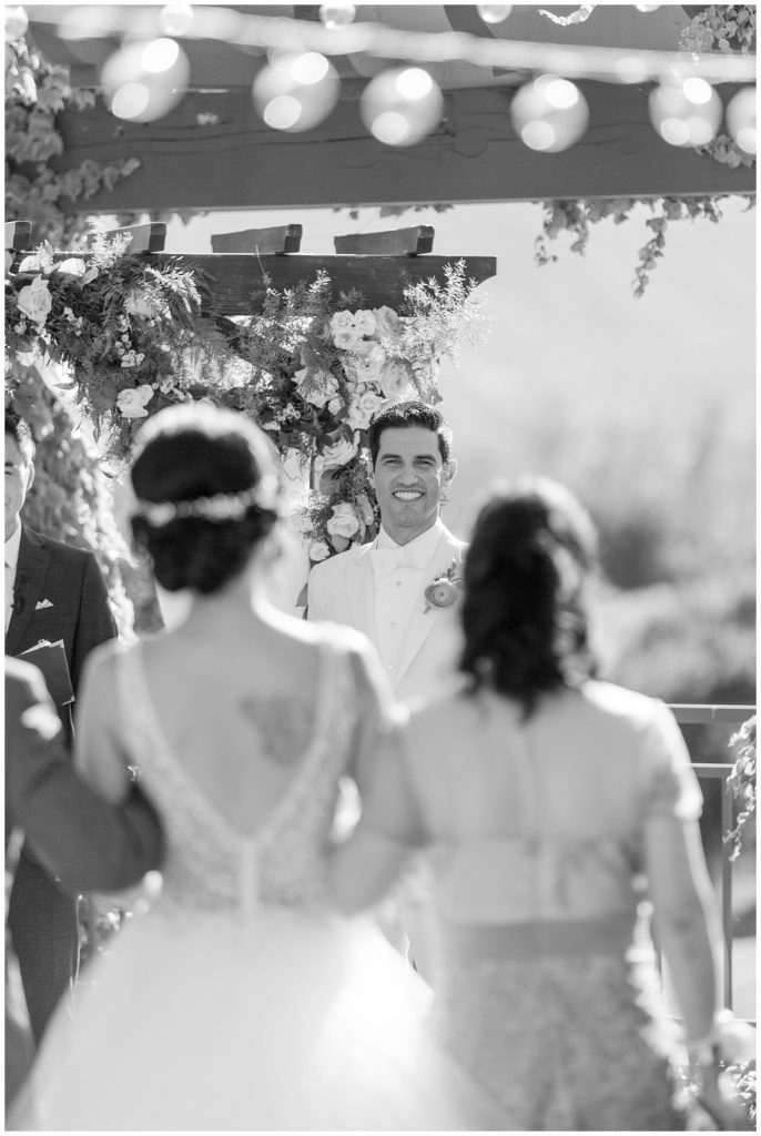 Groom seeing bride for the first time at Stonetree Golf Club