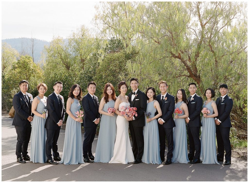 Wedding party in light blue and black