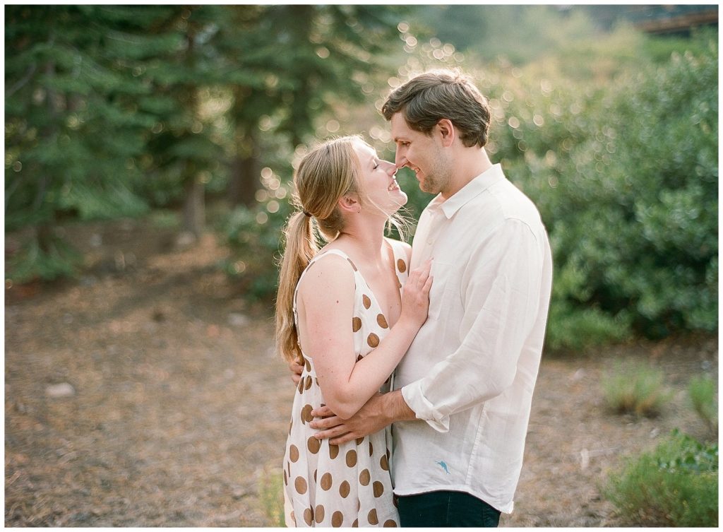 white and brown polk a dot dress engagement photos