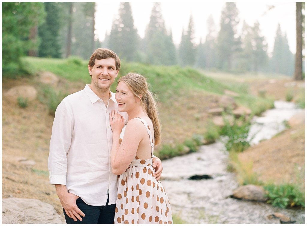 Martis Camp engagement photos with white and brown polk a dot dress