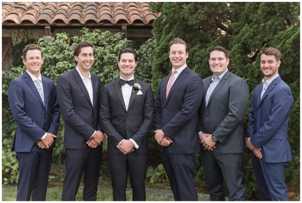 groomsmen in blue suits