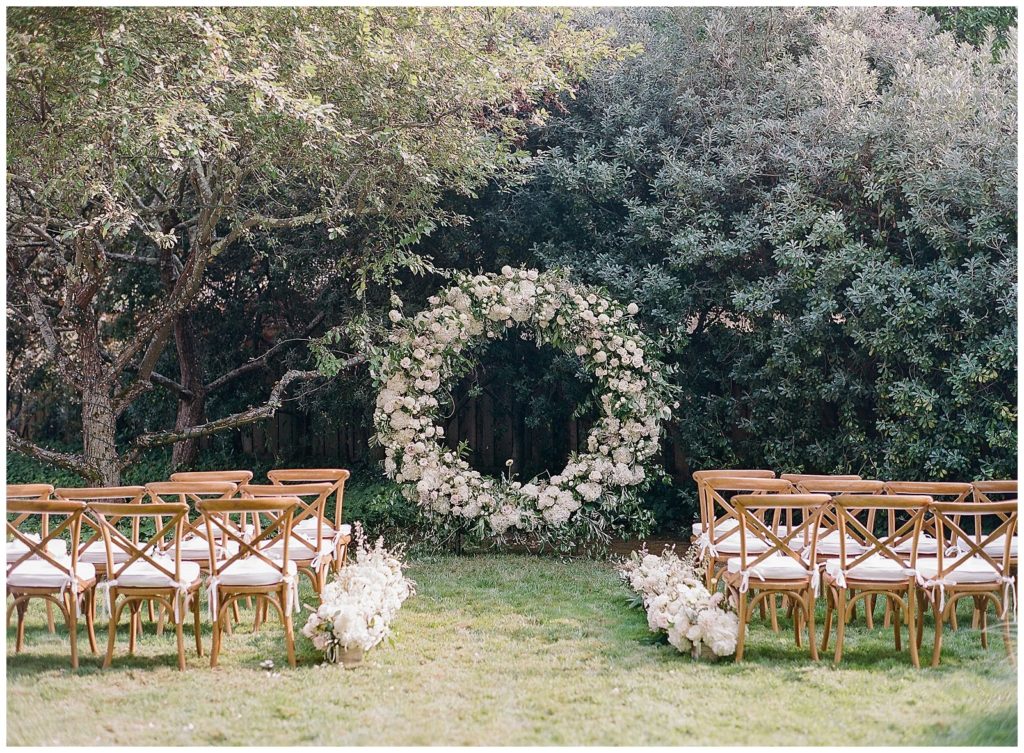 Ceremony floral arch by Apis Floral for wedding in Atherton CA