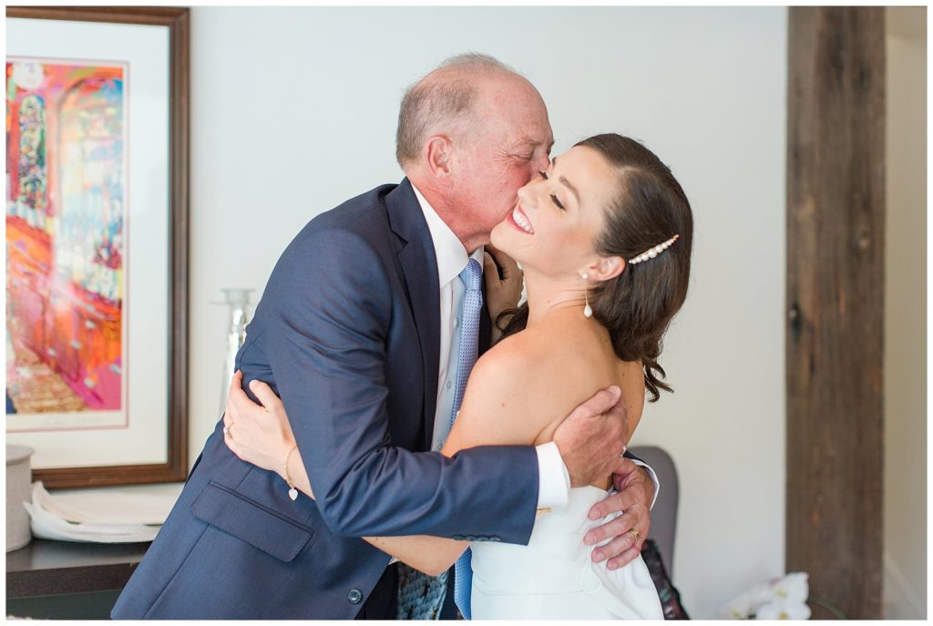 kiss from dad before walking down the aisle